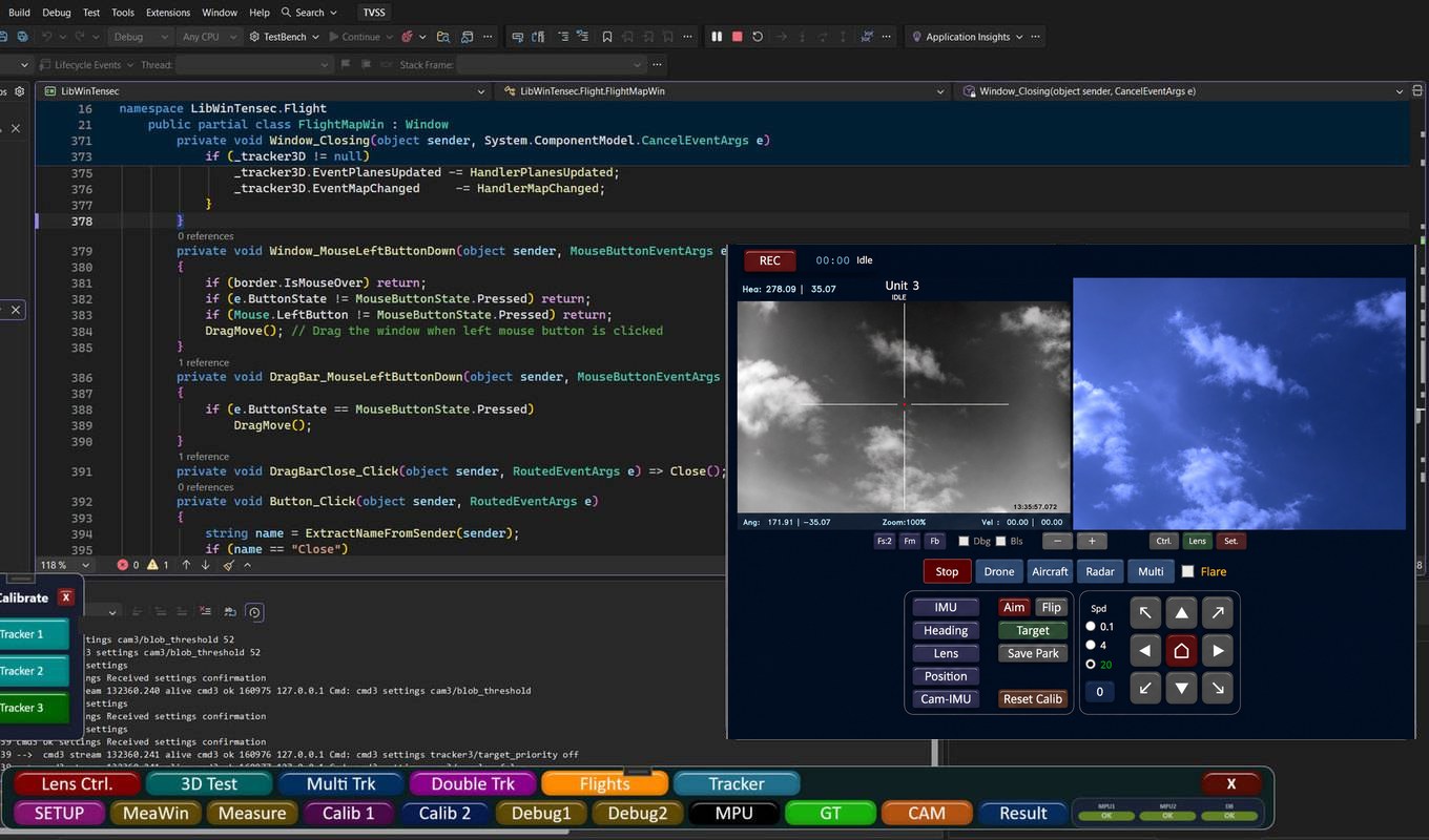 Development bench: source code beside the tracker software running live on thermal and daylight cameras