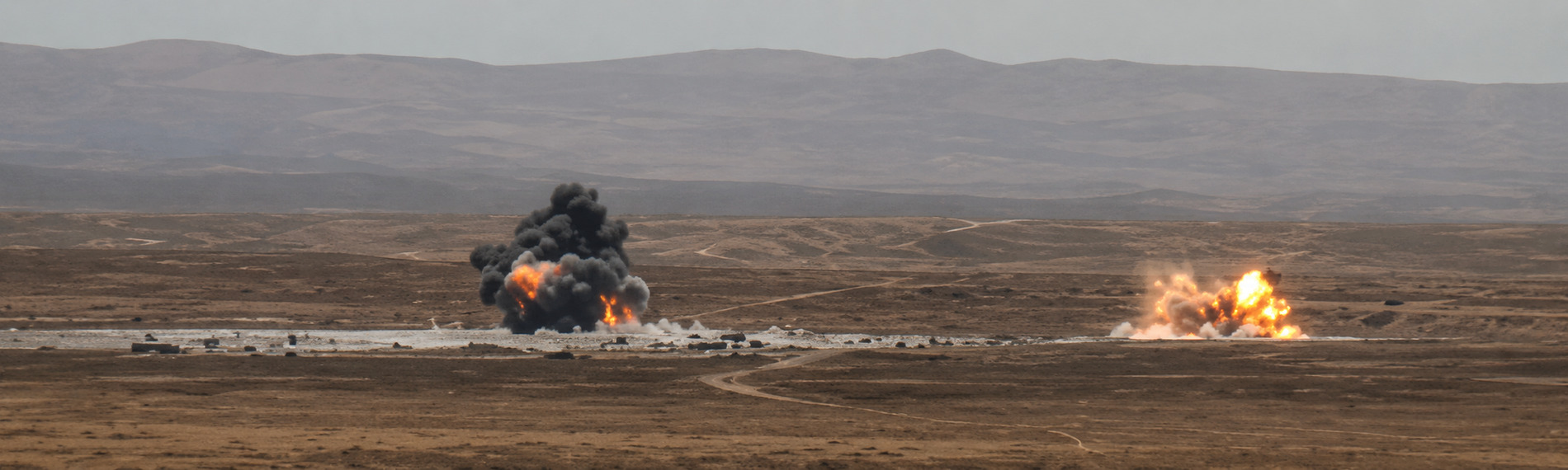 Two simultaneous impacts on the same range during a live-fire pass