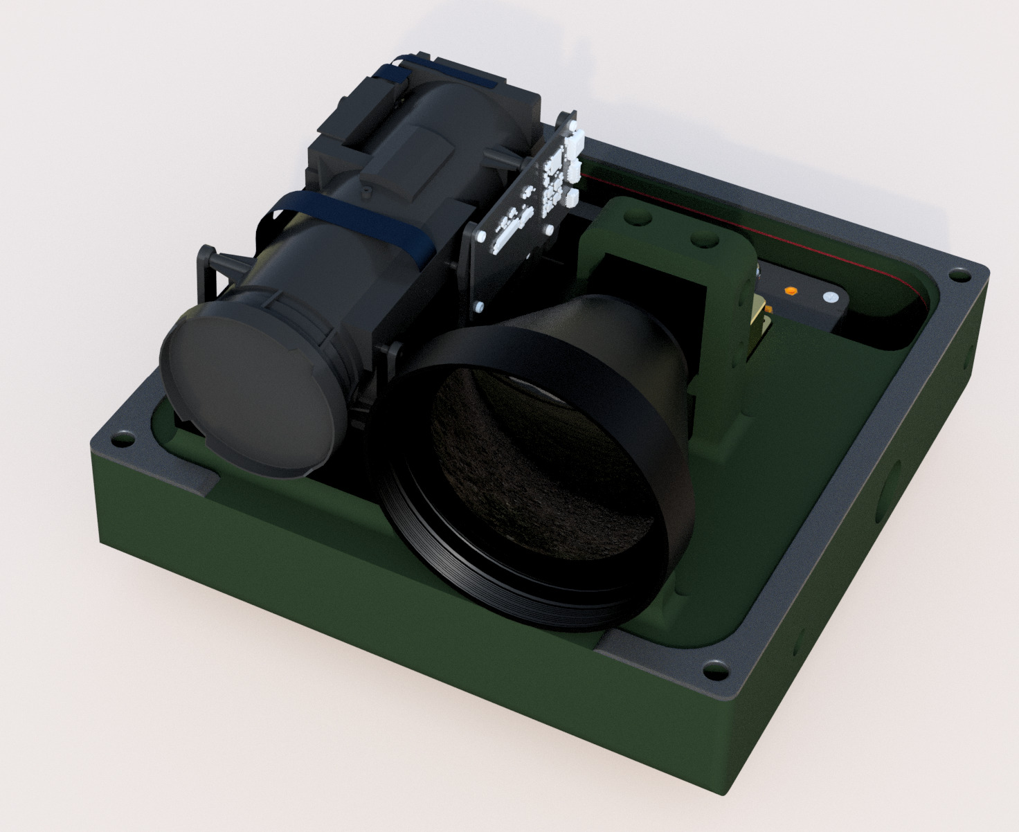 The same head with the cover removed: the thermal objective and the daylight optics side by side inside the housing